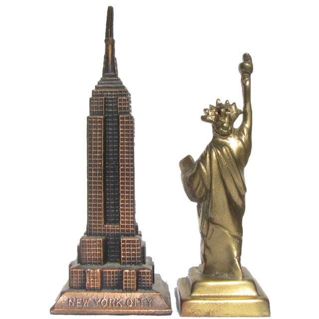 Copper-hued souvenir architectural model with thermometer of New York's Art Deco icon, the Empire State Building and a...