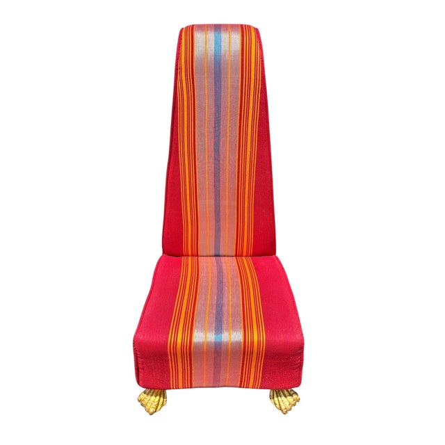 This distinctive slipper chair is a true statement piece, blending classic form with bold, eye-catching design....