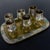 Marvelous vintage MCM (a.k.a.) Mid-Century Modern set of 6 cordial stemmed shots and matching tray composed of brass and...