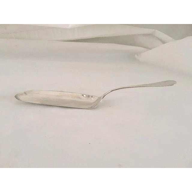 Antique Silver Plate Fish Server with Monogram "A.G.E" Makers mark reads " Reed &Barton" Very good condition.