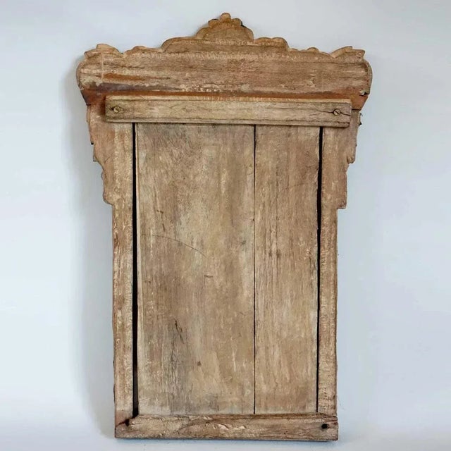 This pair of antique, medium sized, vertical frames was hand crafted with a repousse silver exterior atop a teakwood base....