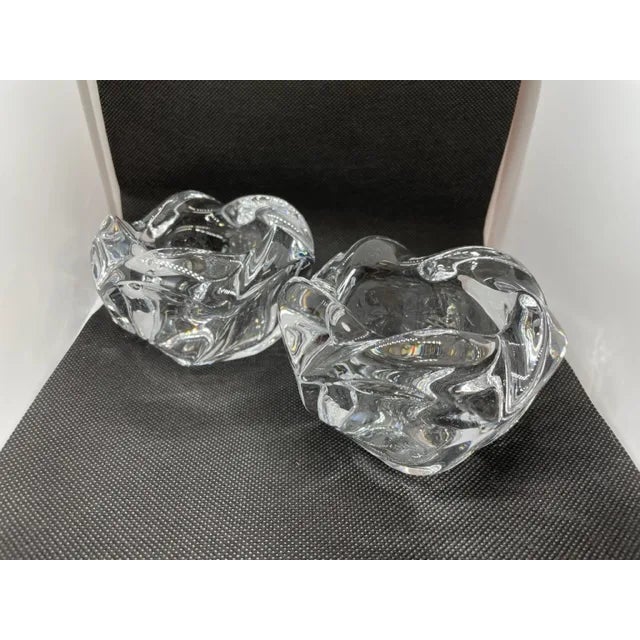 Crystal Votives in an Overlapping 5-Petal Design. Two elegant votive candle holders in a simple, circular, overlapping...