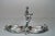 This exquisite pewter candy dish is handcrafted in Italy and features a beautifully sculpted classical female figure...