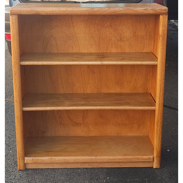 Mid-Mid-20th Century Oak Low Bookcase / Bookshelf. Adjustable shelves. Dimensions: 31.5" in width and 10.25" in depth and...