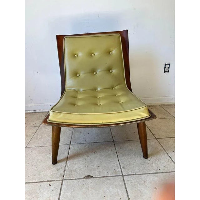 Mid Century Scoop Green Vinyl Lounge Chair by Carter Brothers. Scoop chairs feature a sleek design covered in tufted green...