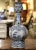 Decorate a console or buffet with this elegant antique vase. Crafted in France, circa 1880, the tall faience vase is...