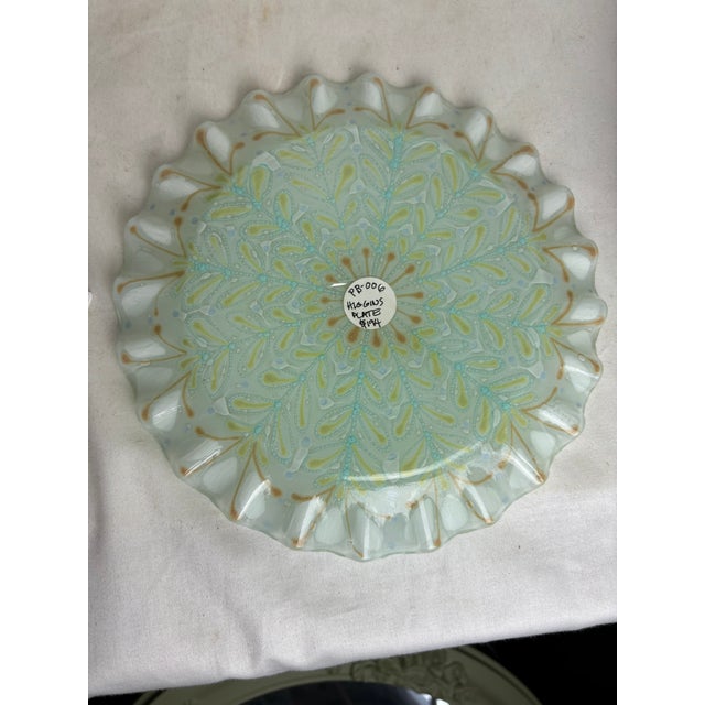Higgins glass was founded in 1948 and was a pioneer of rediscovering and refining the ancient art of glass fusing;...