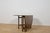 This extending dining table was manufactured by the British furniture maker Jentique during the 1960s. The piece...