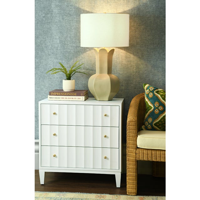 New special order item. Not vintage. The Carmack Fluted Three Drawer Side Table is both whimsical and functional. The...
