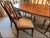 Bring timeless French Country elegance into your home with this authentic Ethan Allen Country French dining set in the...