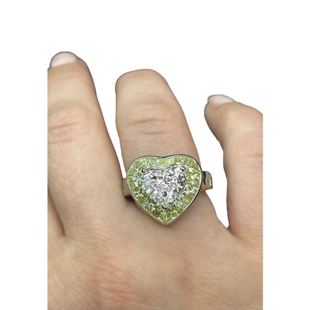 This beautiful engagement ring crafted by Oscar Heyman boasts one heart brilliant cut diamond weighing 3.15 carats with J...