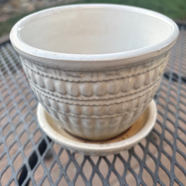 White McCoy Planter with Beaded and Dot Design.