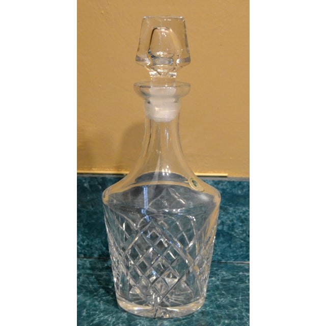 1950s Waterford Crystal is renowned for its high-quality Irish crystal craftsmanship. This vintage whiskey decanter with...