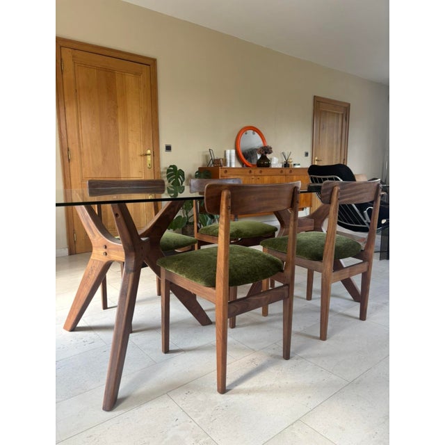 Set of four vintage Scandinavian-style chairs, fully restored. They are in very good condition! The seats have been...