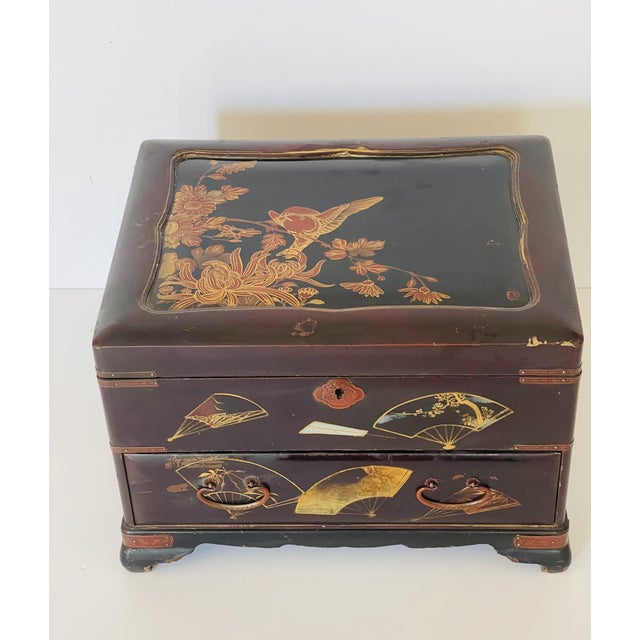 19 th c Antique Japanese Handpainted Lacquer box. Designed in two stories with lots of separations,.masterly painting...