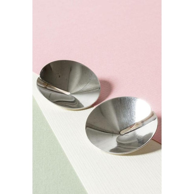 Pair of cool, oversized silver stud earrings from Hans Hansen, in a round concave form that elegantly overlaps. Weight 14...