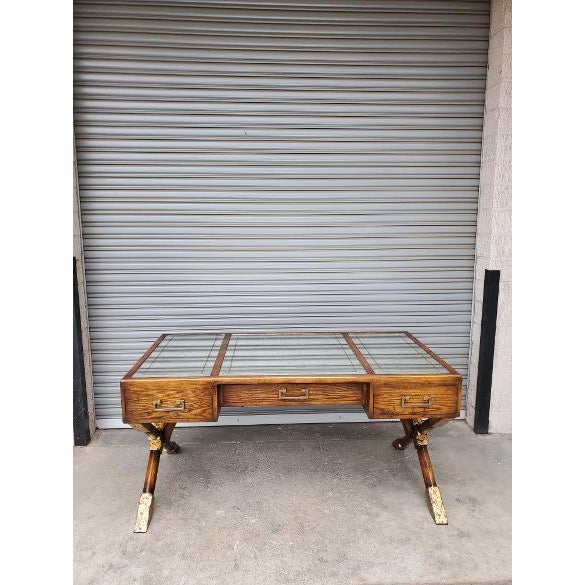 Stunning, vintage campaign desk by designer John Richard. The desk is made out of oak, with brass pulls and distressed...