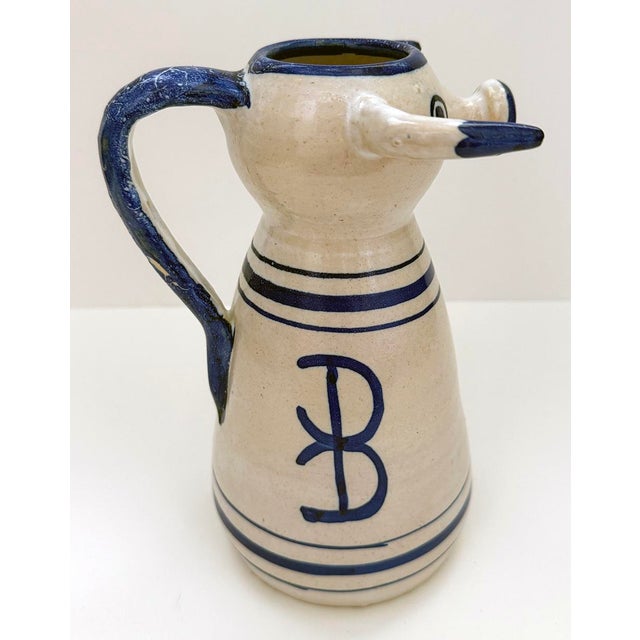 Rustic Mediterranean hand-made and painted pitcher. Pitch is very rustic in design and execution. Clay is a warm off white...