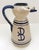 Rustic Mediterranean hand-made and painted pitcher. Pitch is very rustic in design and execution. Clay is a warm off white...