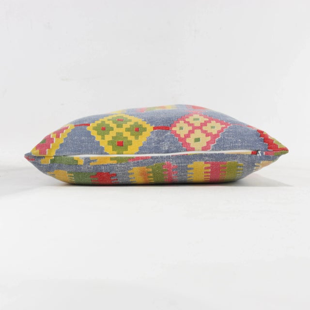 Add a dash of artistic flair to your space with this eye-catching geometric pattern pillow. Its intricate, multi-color...