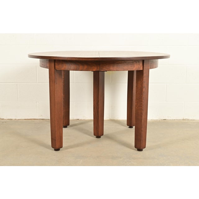 An exceptional antique Mission oak Arts & Crafts extension dining table By L. & J.G. Stickley (signed to the underside)...