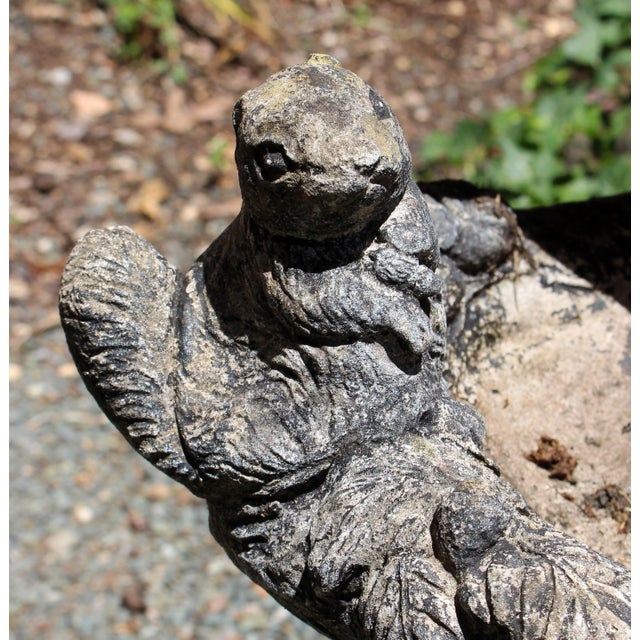 English mid-20th century cast stone birdbath. Two parts. Totally charming with one squirrel perched atop the upper small...