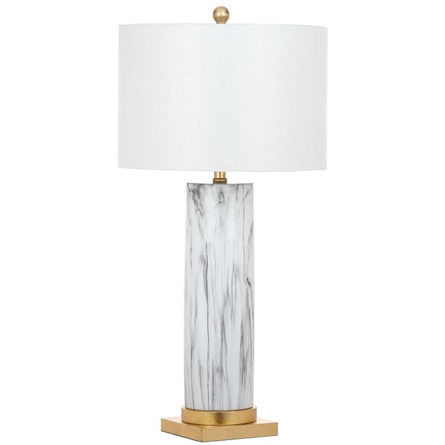 a homage to organic modernism, this contemporary table lamp - a Pair is a combination of natural beauty and sleek style....