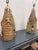 An exceptional pair of monumental handcrafted studio pottery lamps, signed and dated 1992. These highly sculptural ceramic...