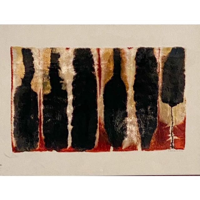 A framed textile, multicolored tiger stripes, Chile circa 2002; signed "P. Moreno" and dated lower right.