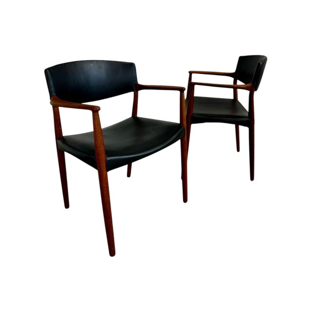 Ejner Larsen & Aksel Bender Madsen Teak and Leather Dining Captain Chairs for Willy Beck, 1950’s Denmark. Pair of side...