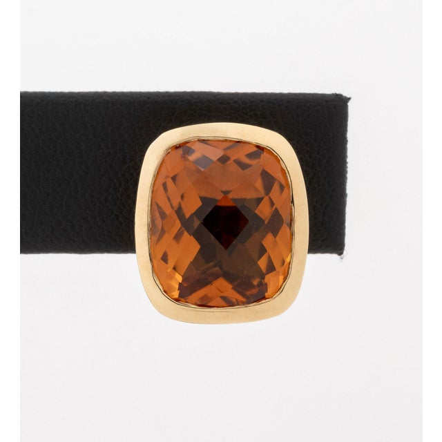 Pair of Modern 14K Rose Gold and Citrine Clip-On Earrings, featuring two prong set cushion brilliant cut citrines,...