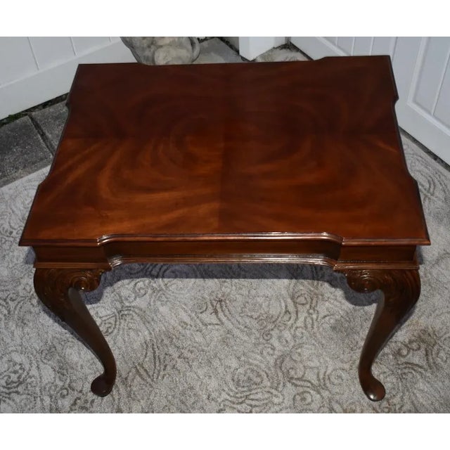 Vintage (1980's) Side/End Table has a Queen Anne Style. Made by Ethan Allen. The Wood is Burl Mahogany. The Table has a...