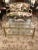 Elegant La Barge brass and beveled glass two tier coffee table having side handles (add 3.5" to width, 2" to h) and...