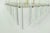 Elevate your living space with these Very Large Mid-Century Lucite Sconces from circa20c, standing an impressive 30" tall...