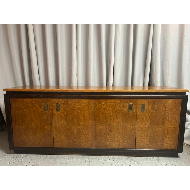 Beautiful two-piece display cabinet by Century Furniture, known for exceptional quality and timeless design. The warm burl...