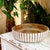 Elevate your home decor with this Round Wooden Carved Bowl, featuring elegant white fluted accents that add a touch of...