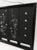 A striking vintage Chinese decorative screen featuring iridescent mother-of-pearl inlay against a deep black lacquer...