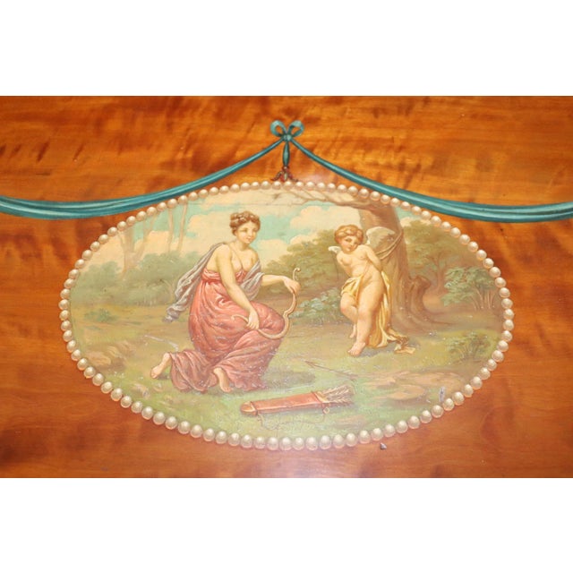 This is a spectacular Adams paint decorated Carlton house desk with some of the finest paint decorated scenery we have...