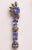 Unusual dangle earrings featuring oval and pear-shaped faceted Tanzanite gemstones with round, brilliant cut diamonds in a...
