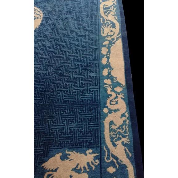 Antique Chinese - Peking Blue 1880s Wool Rug, Circa Date: 1880s. This exceptional example of late Qing Dynasty weaving...