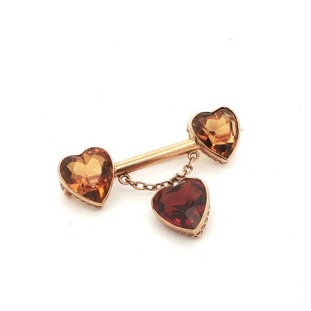 This gorgeous brooch comes from the 1920s Art Deco period in Austria and was made in 14k yellow gold with heart shaped...