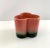 Unusually shaped retro ceramic planter made by Hull Pottery in the 1950s or 1960s. The trefoil shape has a dark pink and...
