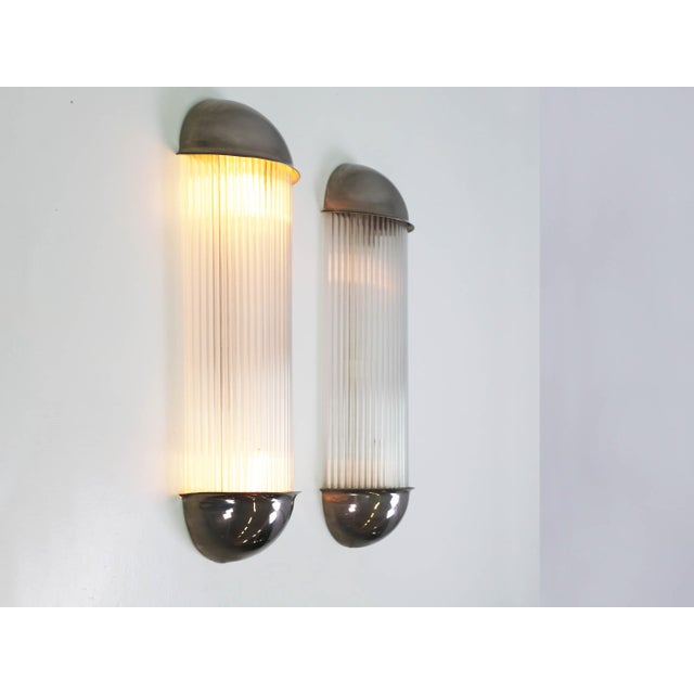 French Art Deco Wall Lights with Glass Rods attributed to Henri Petitot, France, 1920s, Set of 2, in Good conditions....