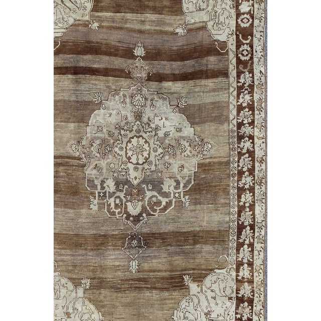 Measures: 8'0 x 12'5. Vintage Turkish Kars Rug With Shades of Brown, Cream, and Ivory Medallion Motif 8'0"x12'5". Keivan...