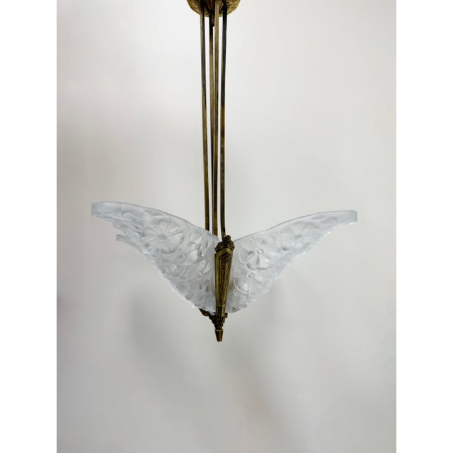 Exceptional French Art Deco ceiling light featuring four original molded frosted glass panels signed Degue (David Guéron,...