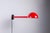 This distinctive extendable wall lamp combines bold colour with ingenious functionality. Crafted from red lacquered metal,...
