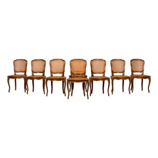 Set of 8 Early 20th Century French Louis XV Style Walnut Cane Dining Chairs For Sale