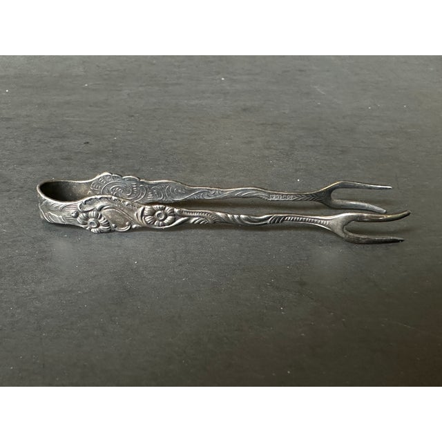 Made in Sweden, these vintage sugar cube tongs will elevate your tea service. The silver tongs have an oxidized finished....