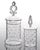 A set of two glass apothecary jars with decorative lids, one large and one small. Small glass dots are applied on the...