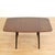 This mid-century drop leaf dining table was produced by in England by E Gomme (G Plan) during the 1950s. With a stunning...